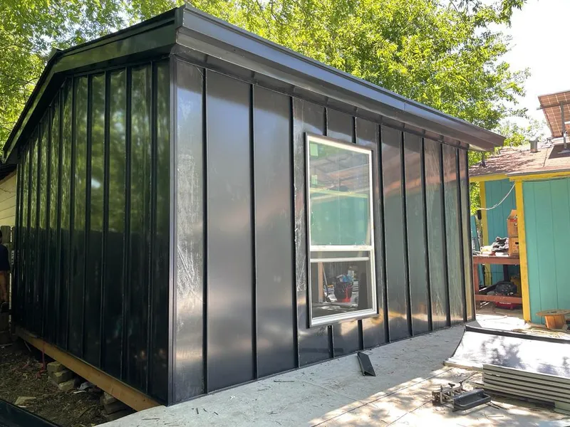 Black standing seam metal wall panels for Metal Roof Installation in Boxborough