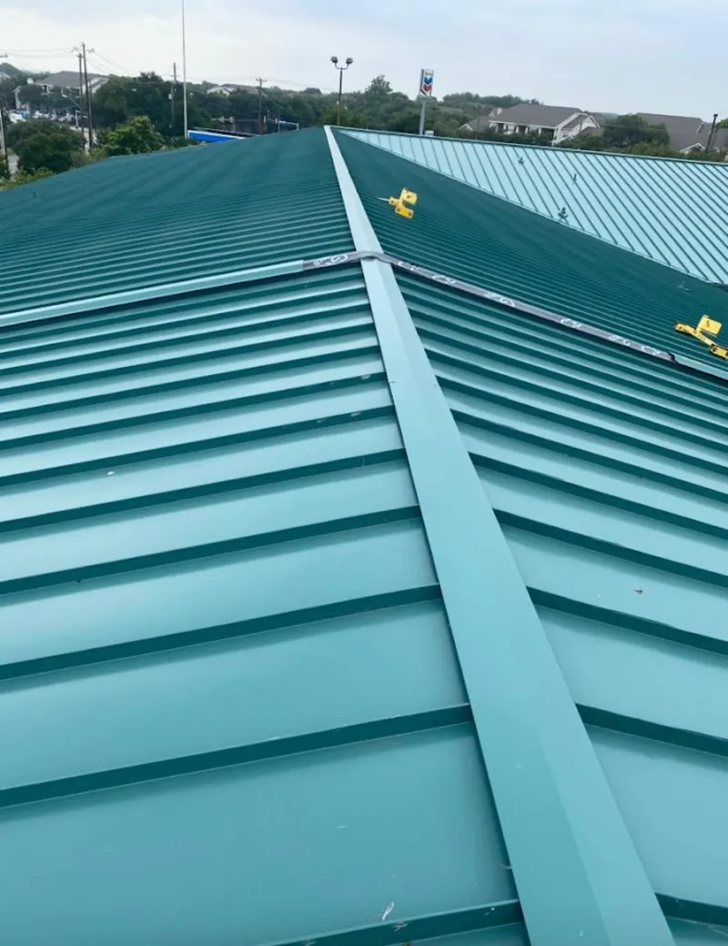 Green commercial metal roof ridge and valley for Metal Roof Repair in Boxborough