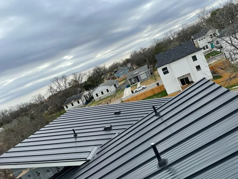 Standing seam metal roof panels with vents for Skylight Repair in Boxborough